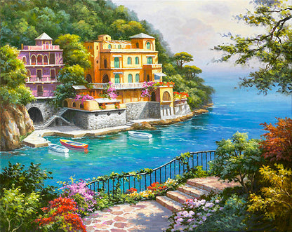 Coastal scene with colorful houses by the sea, surrounded by greenery.