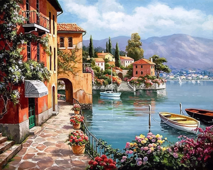 Village by a lake with colorful buildings and boats