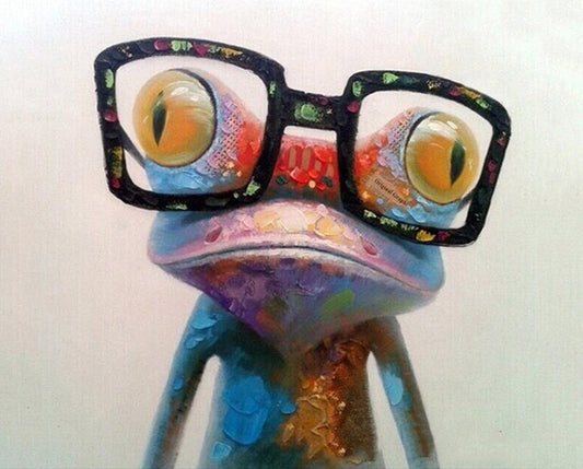 Colorful frog figurine wearing glasses on a white background