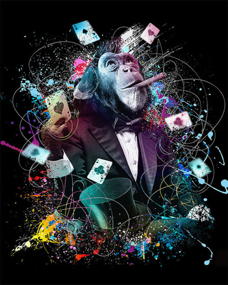Colorful and abstract design with a monkey in a suit surrounded by cards and splashes of color on a black background.