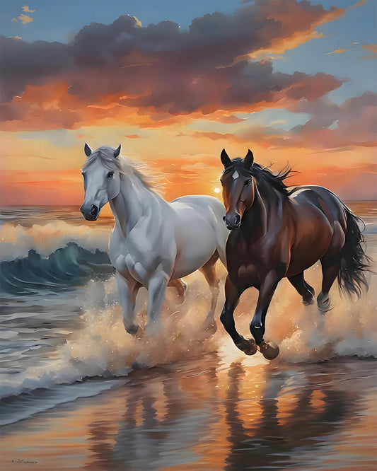 Two horses running on a beach at sunset with colorful skies.